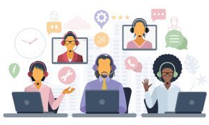 Illustration of three people at laptops wearing headsets: a woman with short hair in a yellow top, a man with a beard in a shirt and tie, and a woman with curly hair in a white top. Behind them are floating icons and screens showing additional headset-wearing figures and symbols for chat, phone, tools, and 24-hour support.